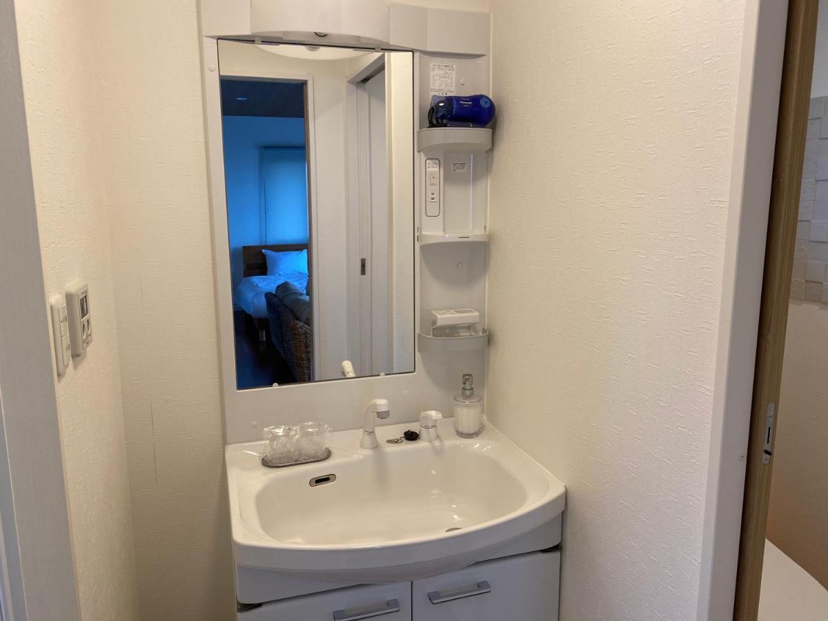 Ocean Front Sumuide Apartman Nago Kültér fotó