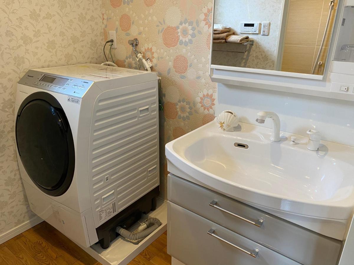 Ocean Front Sumuide Apartman Nago Kültér fotó