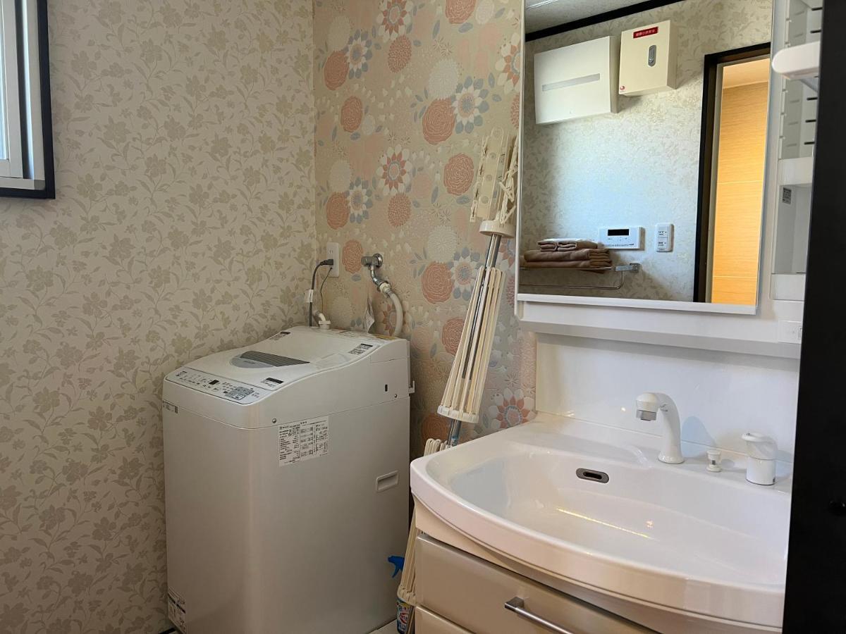 Ocean Front Sumuide Apartman Nago Kültér fotó