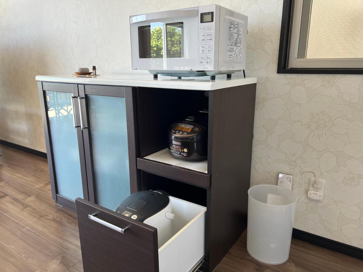 Ocean Front Sumuide Apartman Nago Kültér fotó
