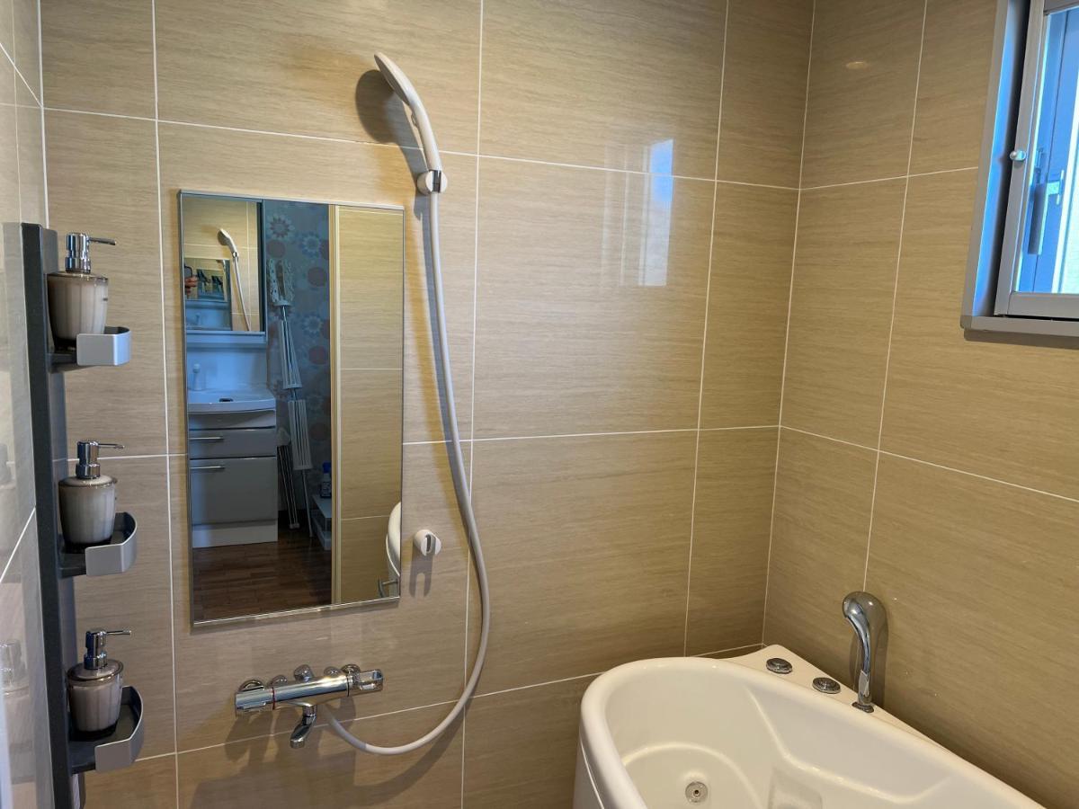 Ocean Front Sumuide Apartman Nago Kültér fotó