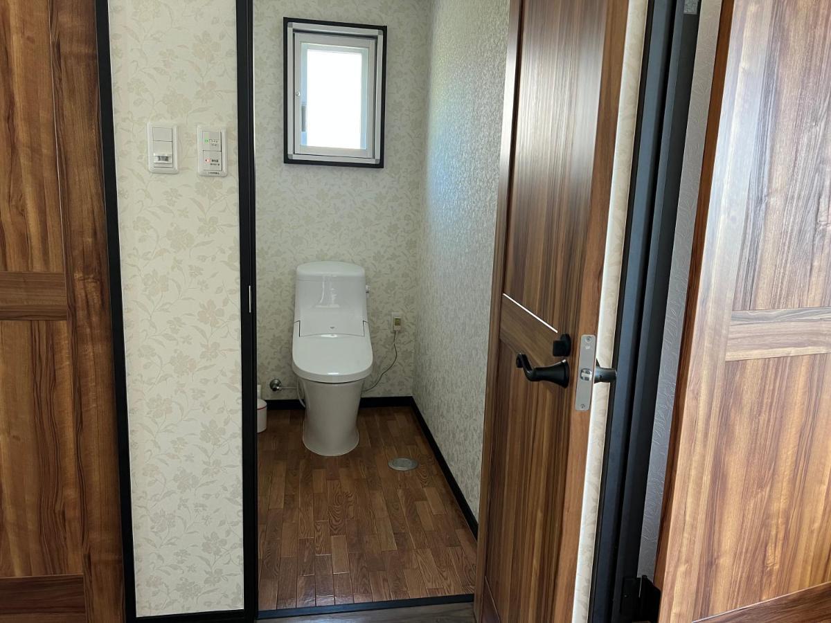 Ocean Front Sumuide Apartman Nago Kültér fotó