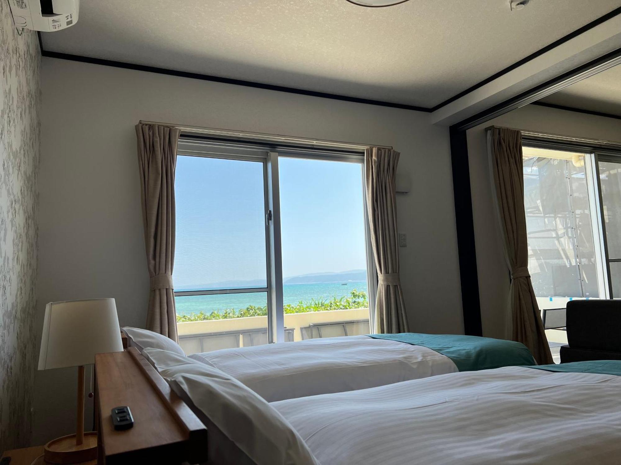 Ocean Front Sumuide Apartman Nago Kültér fotó